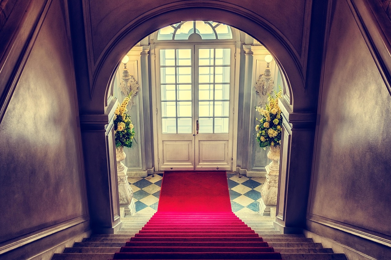Ornate heritage staircase in a grand foyer